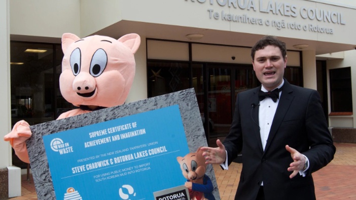 Taxpayers' Union mascot Porky (left) with the lobby group's executive director Jordan Williams during a publicity stunt. (Photo / Stephen Parker)