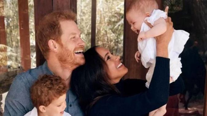 Prince Harry and Meghan with their children Archie and Lilibet.