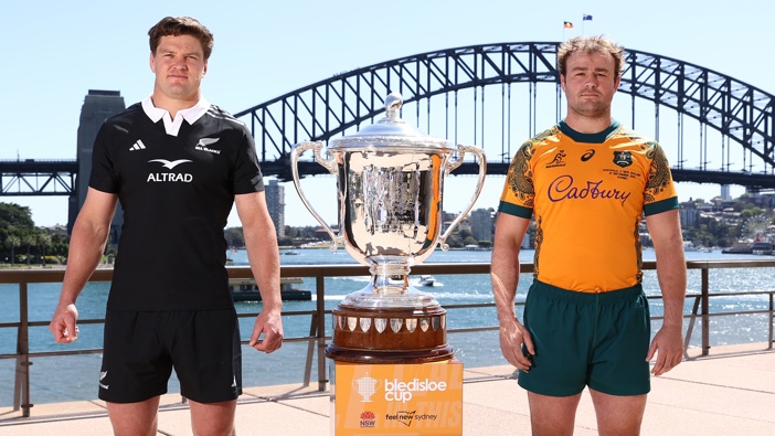All Blacks captain Scott Barrett and Wallabies captain Harry Wilson pose alongside the Bledisloe Cup during a media opportunity ahead of tomorrow night's Wallabies v All Black Bledisloe Cup match, at Sydney Opera House on September 20, 2024 in Sydney, Australia. (Photo by Jason McCawley/Getty Images)