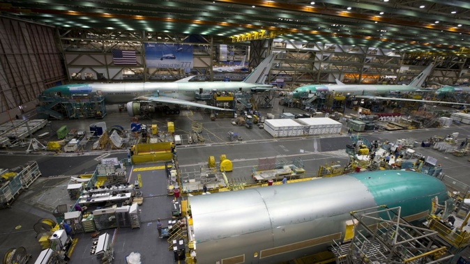 A Boeing 777 production assembly line at the Boeing factory in Everett, near Seattle. Boeing had planned to deliver about 50 aircraft to China this year, but that has now been halted. Photo / Brett Phibbs
