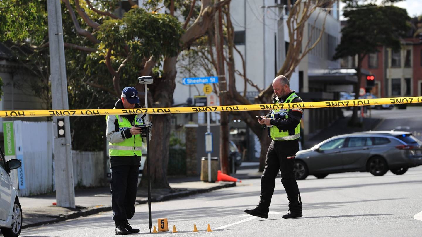 Police investigate the site where a woman was struck by a car on Ponsonby on Saturday afternoon. Photo / Hayden Woodward