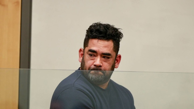 Uatesoni Filimoehala appears for sentencing in Auckland District Court after admitting to creating a fake business to collect $120,000 in Covid-19 wage subsidies. (Photo / Alex Burton)