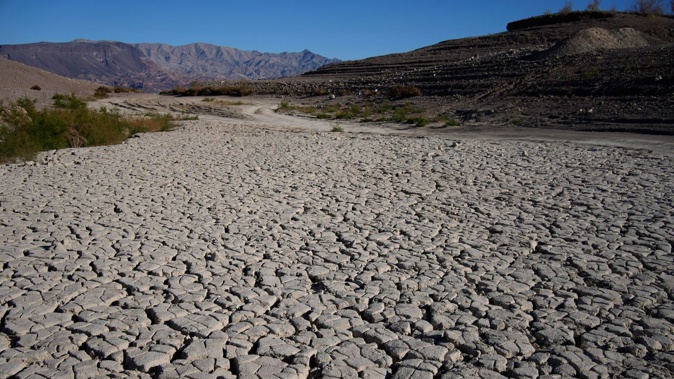Cracked earth in an area once under the water of Lake Mead on January 27, 2023, near Boulder City, Nevada. John Locher/AP