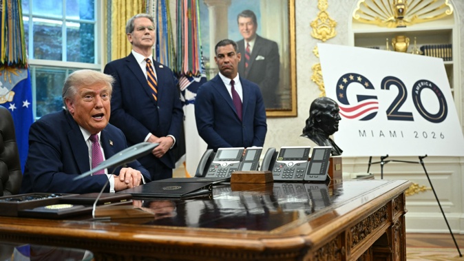 US President Donald Trump speaks after signing executive orders as the Secretary of the Treasury Scott Bessent (C) and Miami Mayor Francis Suarez look on in the Oval Office of the White House in Washington, DC on September 5, 2025. Photo / Mandel Ngan, AFP
