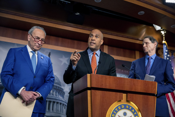 Senate Majority Leader Chuck Schumer, D-N.Y., Sen. Cory Booker, D-N.J., and Sen. Ron Wyden, D-Ore., announce a draft bill that would decriminalize marijuana on a federal level Capitol Hill in Washington. (Photo / AP)