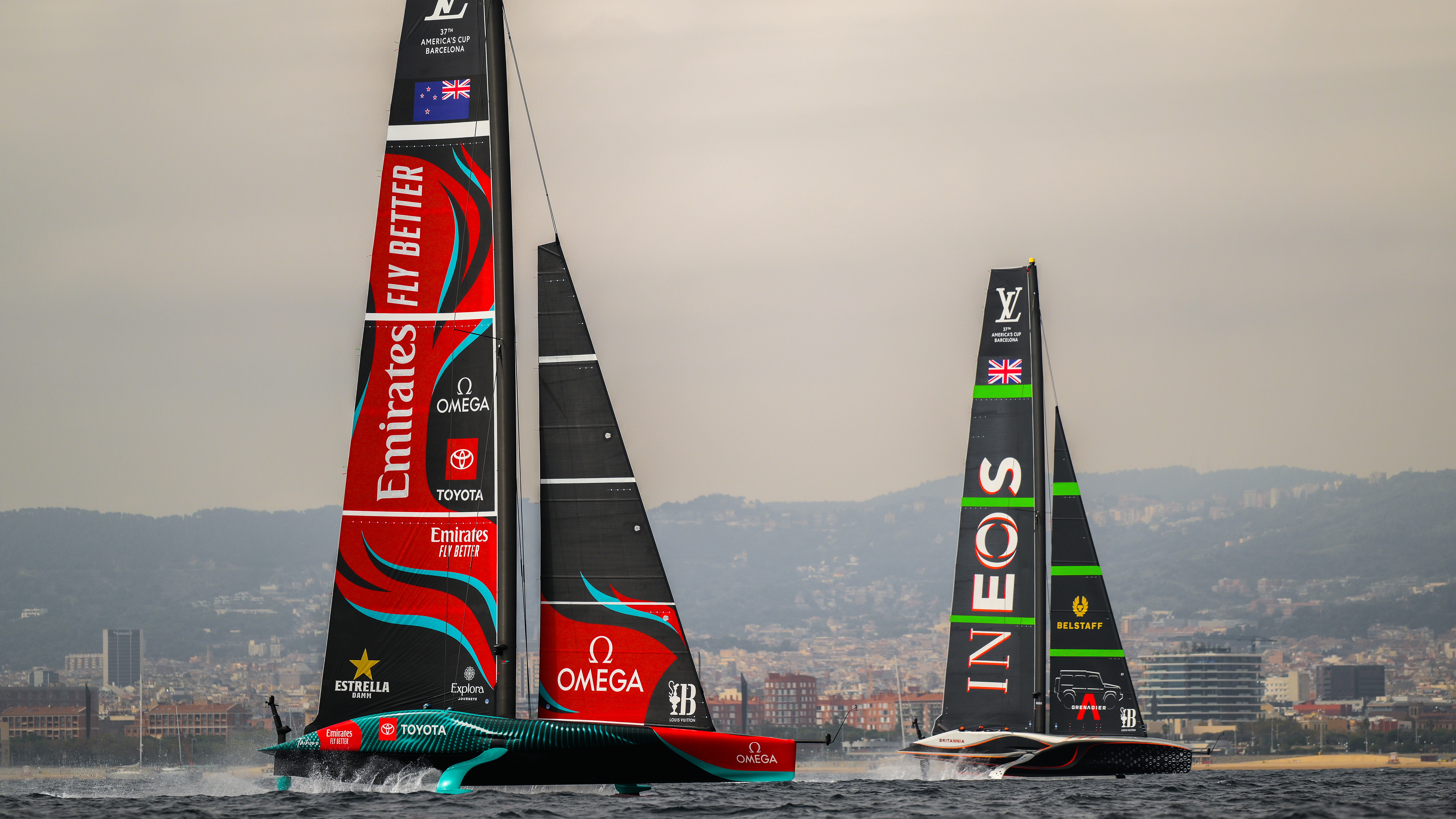 The crew of both boats compete during the race between Emirates Team New Zealand and Team Ineos Britannia in the race 4th of the 37th America's Cup on October 14, 2024 in Barcelona, Spain. (Photo by David Ramos/Getty Images)