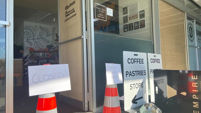 Two people have been arrested after smashing their way into Empire Coffee Roasters on Sunday. Photo / Mitchell Hageman