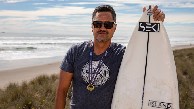 Darren Kiwi was surfing in Arataki when he spotted a family caught in a rip. Photo / Mead Norton