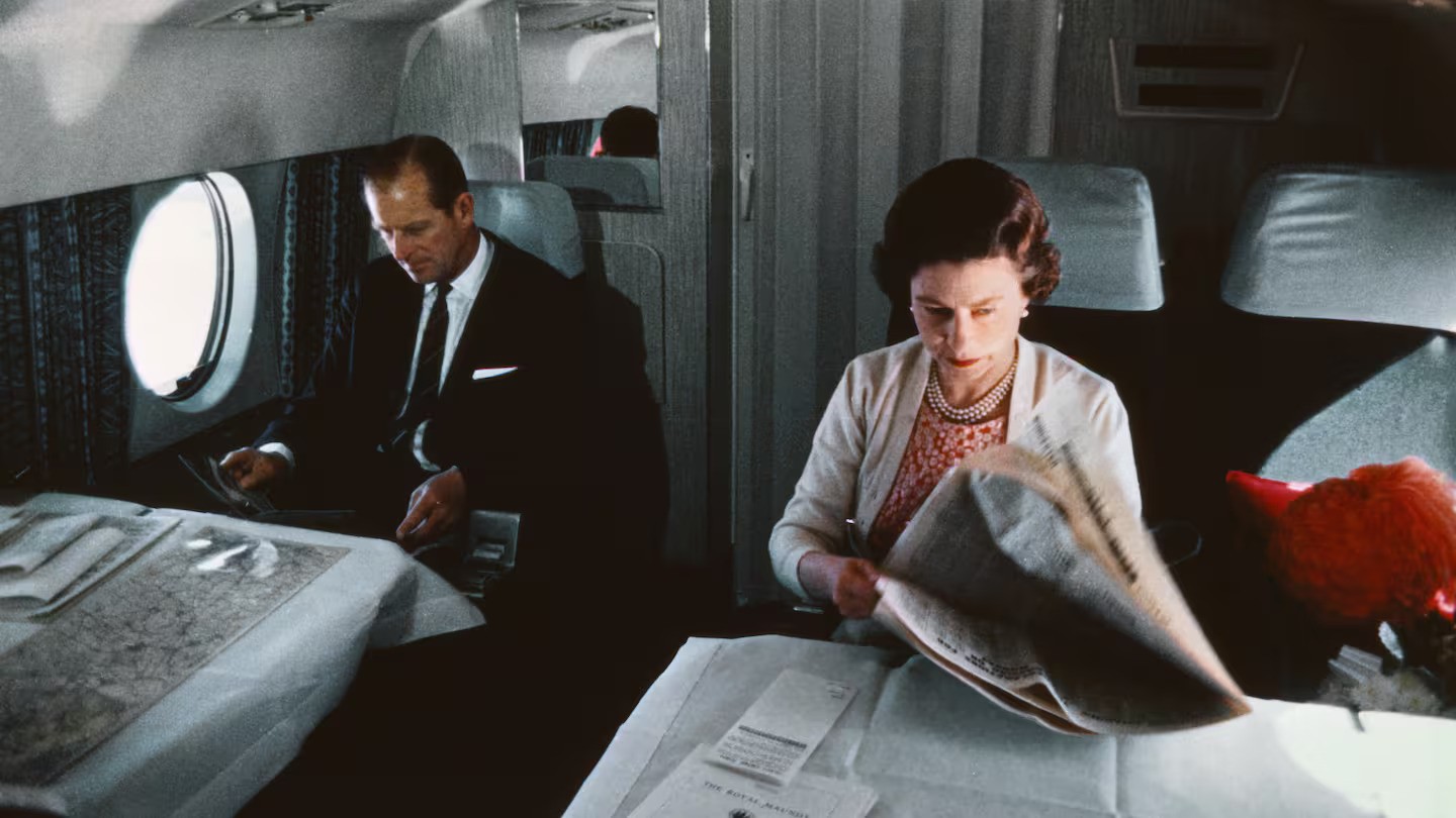 Queen Elizabeth II and Prince Philip, pictured flying during the filming of ITV-BBC documentary The Royal Family. Photo / Bettmann