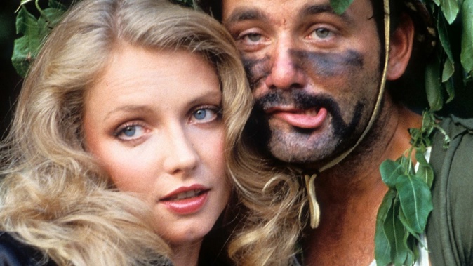 Cindy Morgan And Bill Murray Nestled Behind A Tree In A Scene From The 1980 Film Caddyshack. Photo / Getty Images