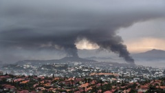 Smoke rises during protests in Noumea, New Caledonia, Wednesday May 15, 2024. Photo / AP | Nicolas Job