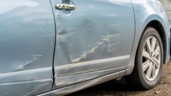 The Disputes Tribunal has found a woman couldn't have been responsible for damage to the side of a rental car — not shown above — when she was able to get out of the badly damaged driver's side. Stock Photo / 123RF