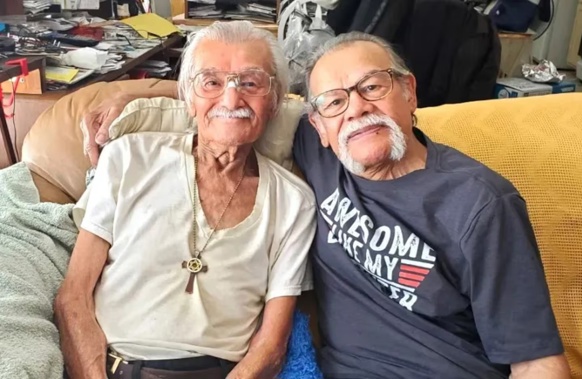 Roger Albino, left, with his younger brother Luis after the pair were reunited. Photo / Alida Alequin