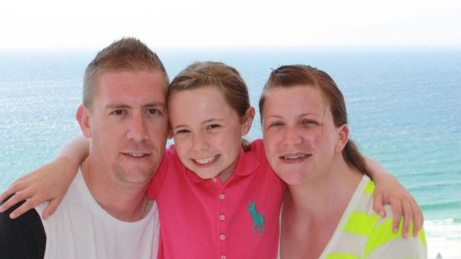 Dave Turner with his wife Kate Goodchild, who died in the Dreamworld tragedy, and their daughter Ebony, who miraculously survived. Photo / Supplied