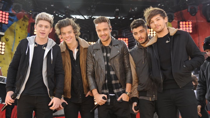 One Direction's Niall Horan, Harry Styles, Zayn Malik and Louis Tomlinson have paid tribute to Liam Payne (centre). Photo / Getty Images
