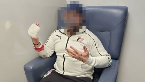Gagon Dhamijaa in hospital after having his hands slashed during an alleged road rage knife attack in Ōtāhuhu, South Auckland.
