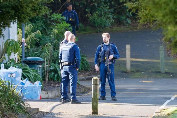 Police guard the scene of a homicide in Auckland's Blockhouse Bay. Photo / Michael Craig