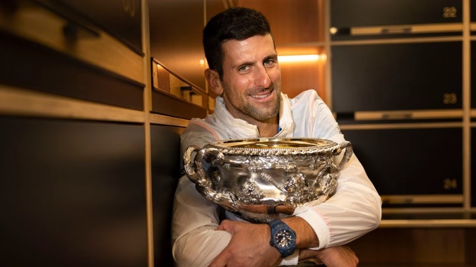Novak Djokovic with the Australian Open trophy. Photo / AP