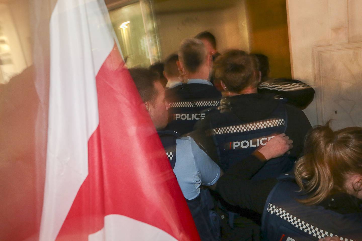Police move in on Stop Co-Governance meeting in Hastings CBD to remove protestors. Photo / Paul Taylor
