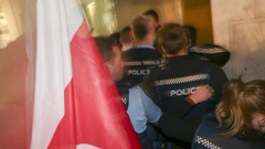 Police move in on Stop Co-Governance meeting in Hastings CBD to remove protestors. Photo / Paul Taylor