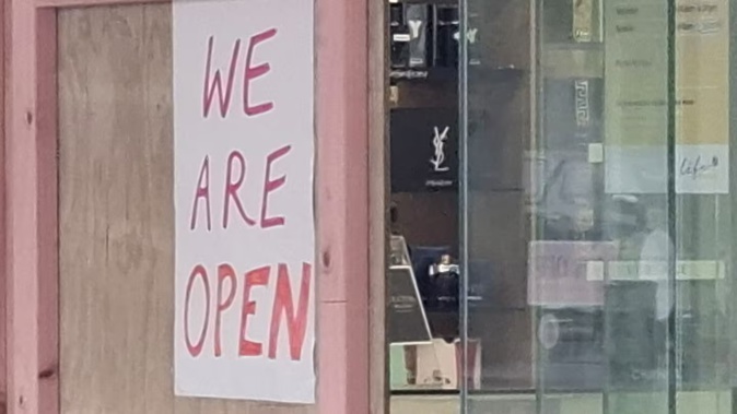 The entrance of burgled Life Pharmacy, still awaiting a replacement door eight days after an early-morning raid in the Napier CBD. Photo / Doug Laing.