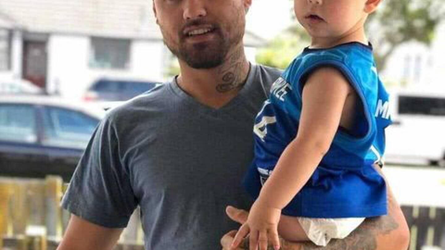 Chad Parekura with his son Tatum-Reign. Parekura died on Saturday night from multiple stab wounds. He is remembered as a proud father. Photo / Supplied