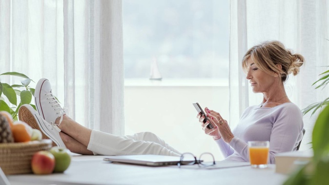 Enabling an eSIM allows one phone to have two numbers. Photo / Getty Creative