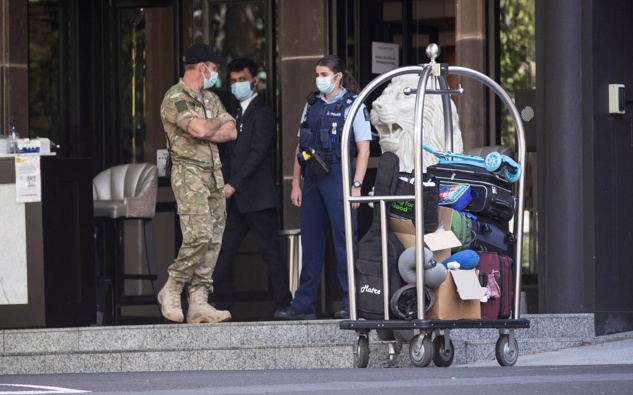 Guests leaving the Pullman Hotel's MIQ facility in Auckland last year. (Photo / Dean Purcell)