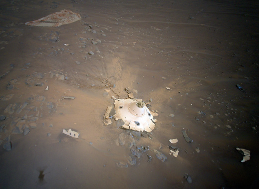 Cables attaching the backshell (center) to the parachute (top left) appear to still be intact. (Photo / CNN)