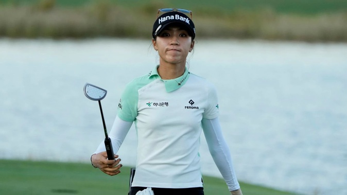 Lydia Ko acknowledges the crowd after finishing her opening round at the CME Tour Championship. Photo / AP