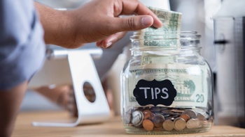A family was stranded in US by grounded flight. Then they tried to claim back $253.34 tipping bill