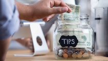A family was stranded in US by grounded flight. Then they tried to claim back $253.34 tipping bill