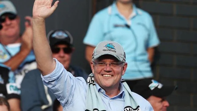 Scott Morrison watching the Sharks in May 2019. (Photo / Getty)