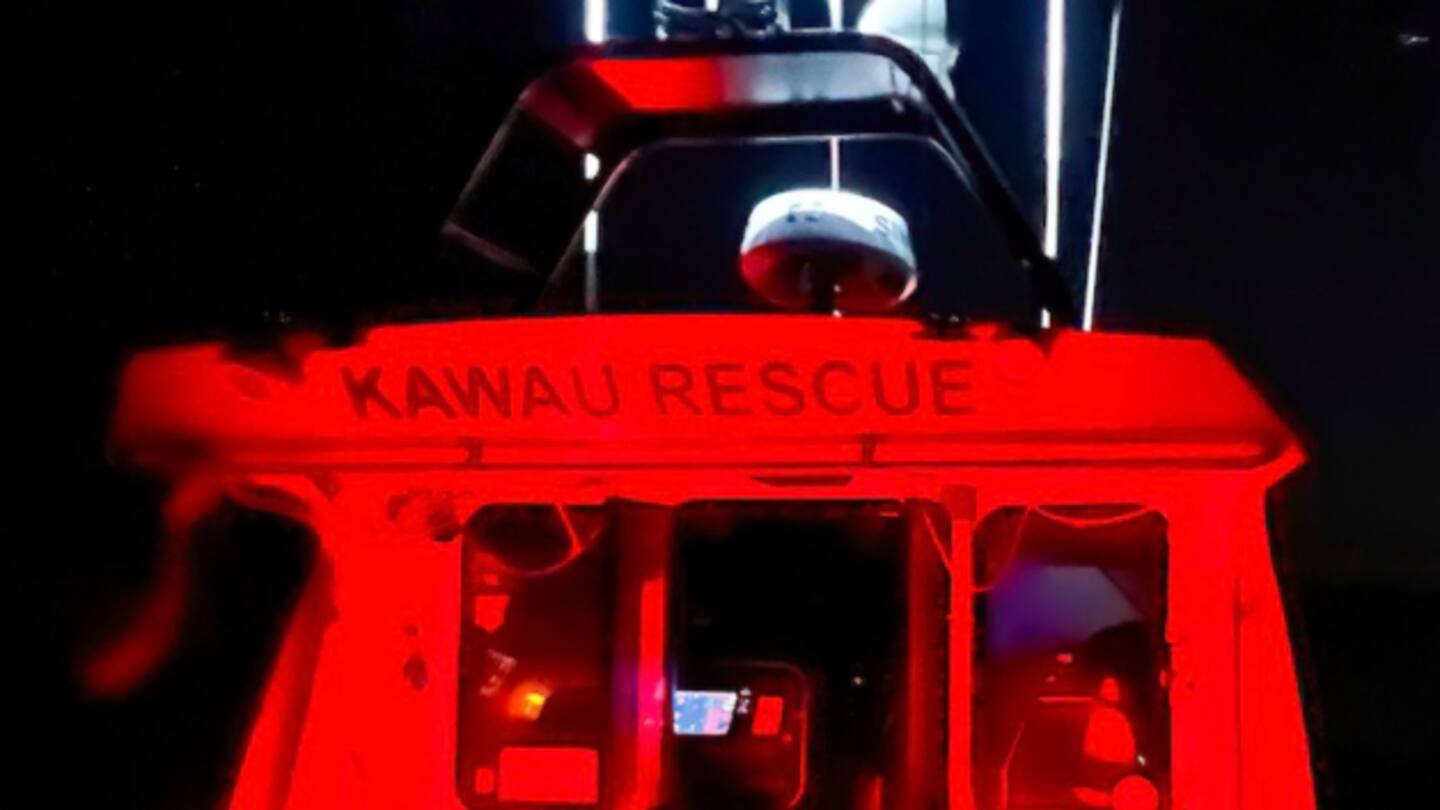 Darkness, wind and 'lively' seas as rescuers race to person stuck on cliff face