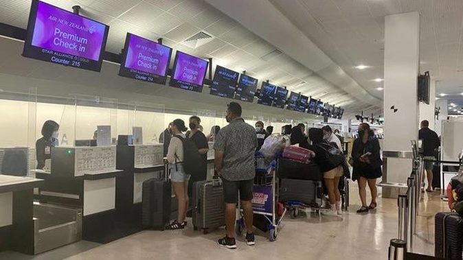 Passengers head off to the Cook islands after the travel bubble reopened. Photo / RNZ