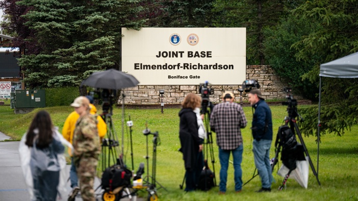 Members of the media outside the entrance of Joint Base Elmendorf-Richardson in Anchorage, Alaska, US, on Thursday, Aug. 14, 2025. Photo / Al Drago/Bloomberg via Getty Images