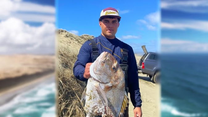 Koby Hokai, 18, at Ninety Mile Beach, with all that was left of his prize snapper catch for the day, after a shark took the rest. Photos / supplied