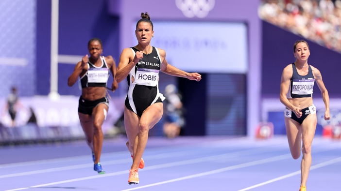Zoe Hobbs of Team New Zealand competes during the Women's 100m Round 1 on day seven of the Olympic Games Paris 2024 at Stade de France on August 02, 2024 in Paris, France. (Photo by Hannah Peters/Getty Images)