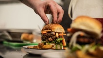 Gourmet, Not Garbage: Wellington restaurant turns food waste into delicious burgers 
