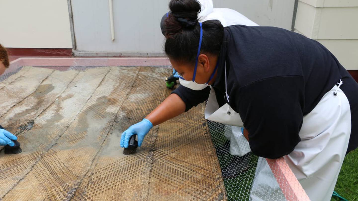 Whānau from Rangatira Marae are trying to preserve what taonga they could salvage after Cyclone Gabrielle. Photo: RNZ / Jamie Tahana