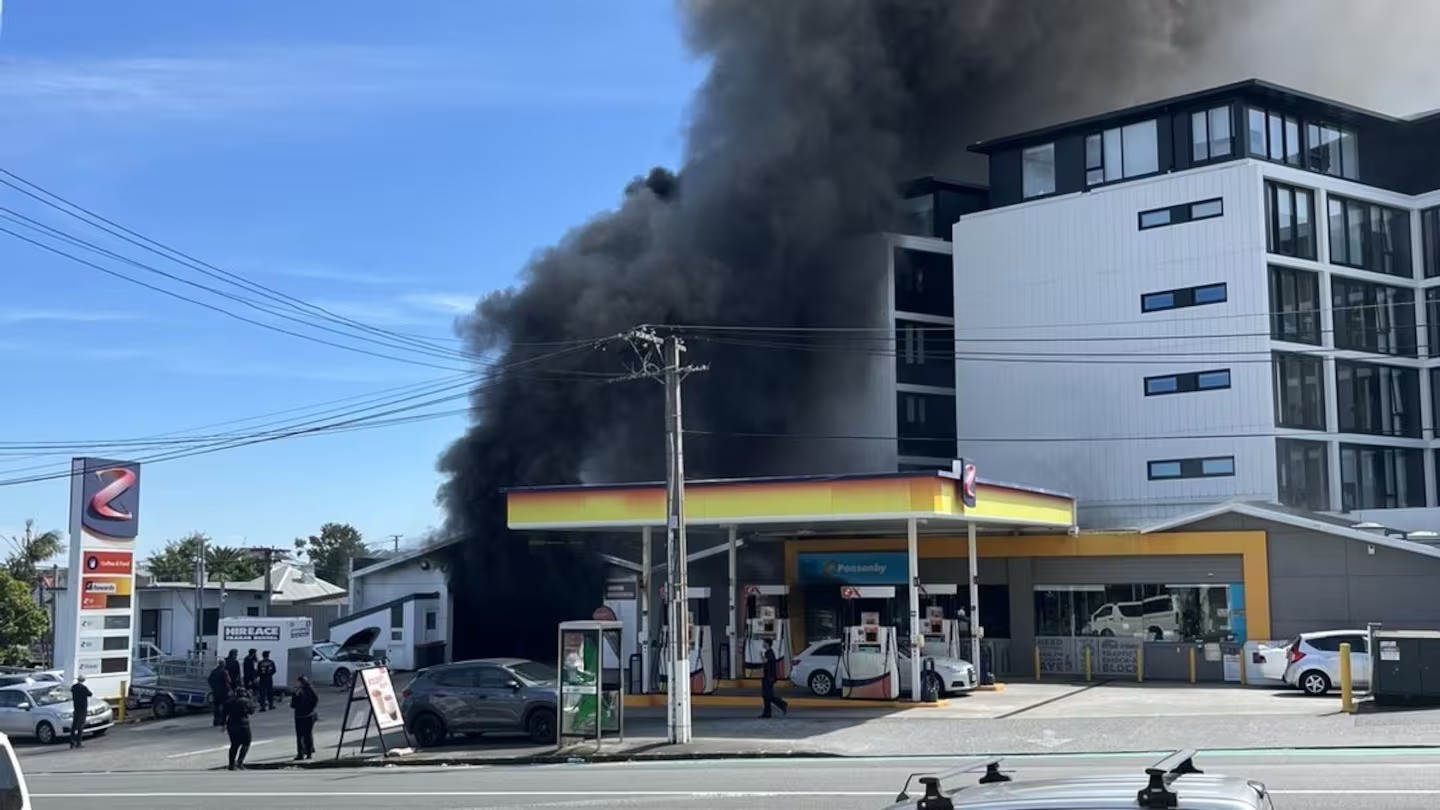 Blaze sends thick black smoke across central Auckland near petrol station