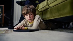 Kiwi kids are spending about a third of after-school time on screens, new research reveals. Photo / Getty Images