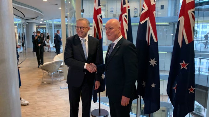 Christopher Luxon shakes hands with Anthony Albanese in Sydney during a 2023 visit. Photo / Adam Pearse