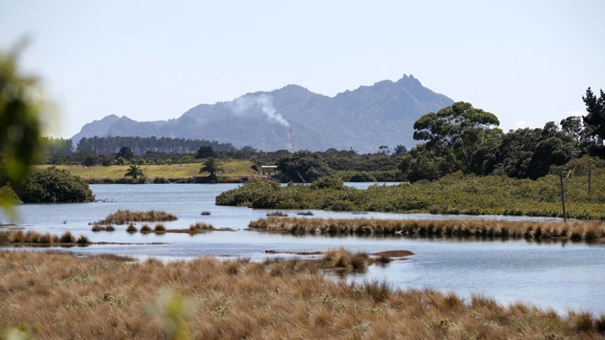 Police are at Ruakākā River, Whangārei, today after a body was found in the water
