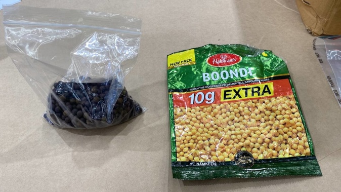 Officers found the 10kg of pills hidden inside snack packets from India. Photo / Customs NZ
