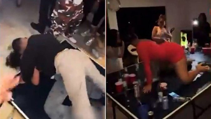 Videos of a party held on Saturday show an apartment packed with at least 50 young adults drinking, dancing and kissing, with some gyrating together on a table. (Photo / NZ Herald)