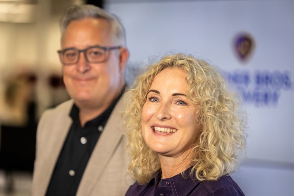 WBD New Zealand boss Glen Kyne and Stuff owner Sinead Boucher today at the announcement. Photo / Michael Craig