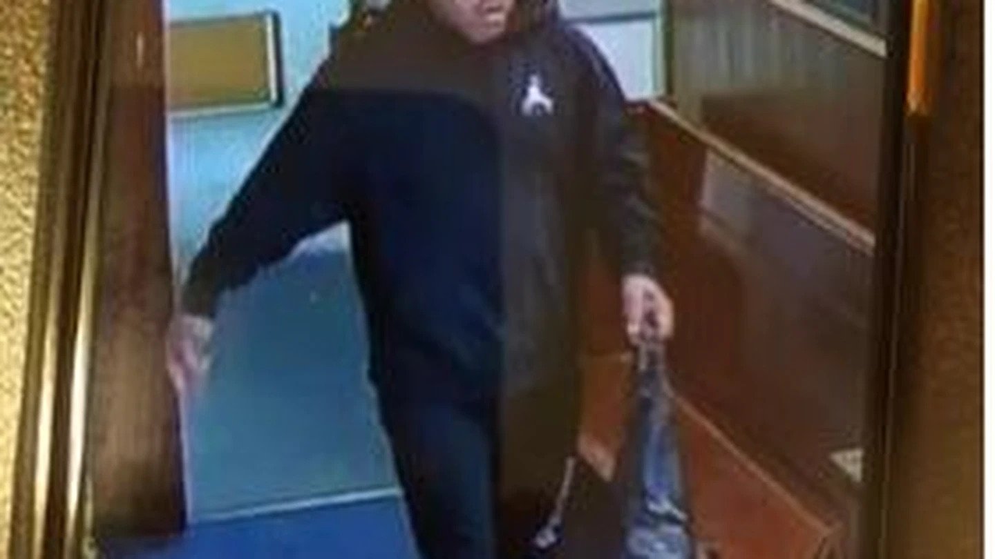 The alleged handbag thief was caught on CCTV leaving the church. (Photo / Supplied)