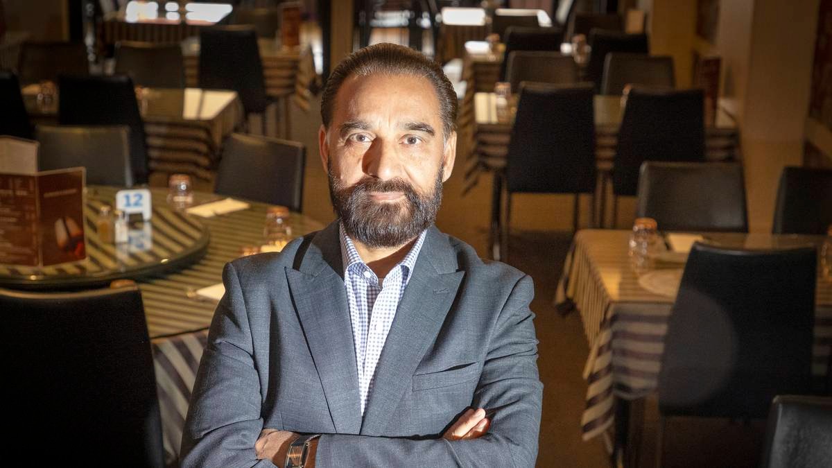 Ray Singh talks about the struggle of the cost of living including increased food costs and a significant change in foot traffic. Photo / Andrew Warner