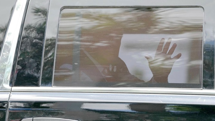 Former US President Donald Trump leaves his resort in Florida en route to his court appearance in Miami. Photo / AP